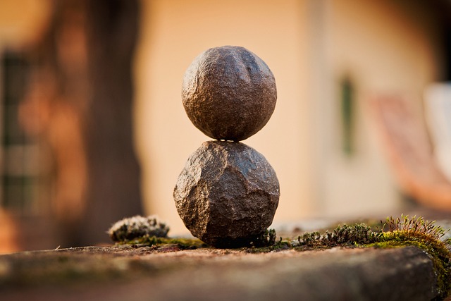 Two stacked nuts, symbolizing unity and balance, exemplify mindfulness in this image.