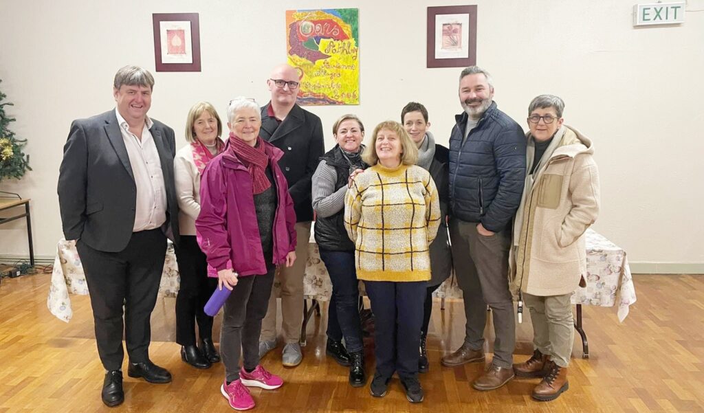 Athboy Development Forum members standing together in a room