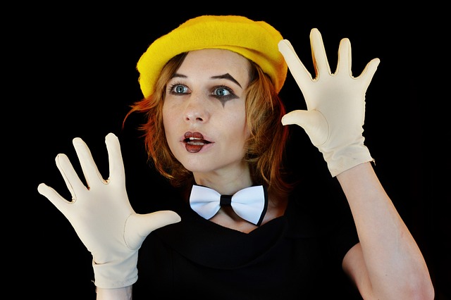 Female with yellow hat and gloves.