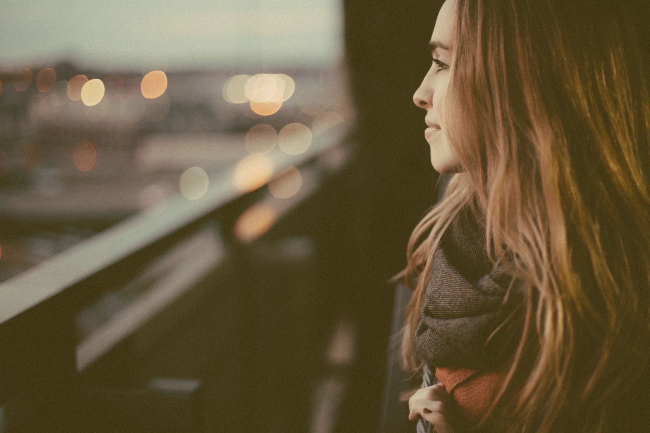 Young woman looks into the distance