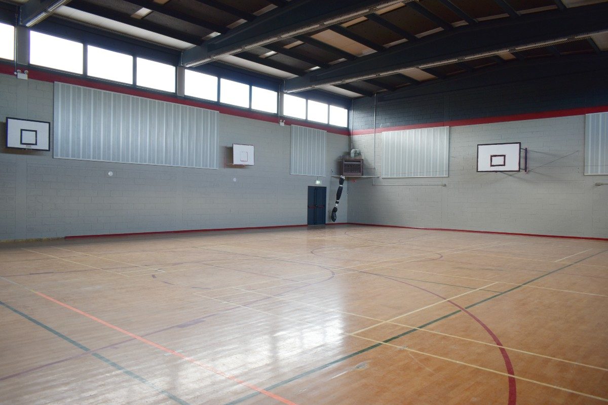 A wooden basketball court.