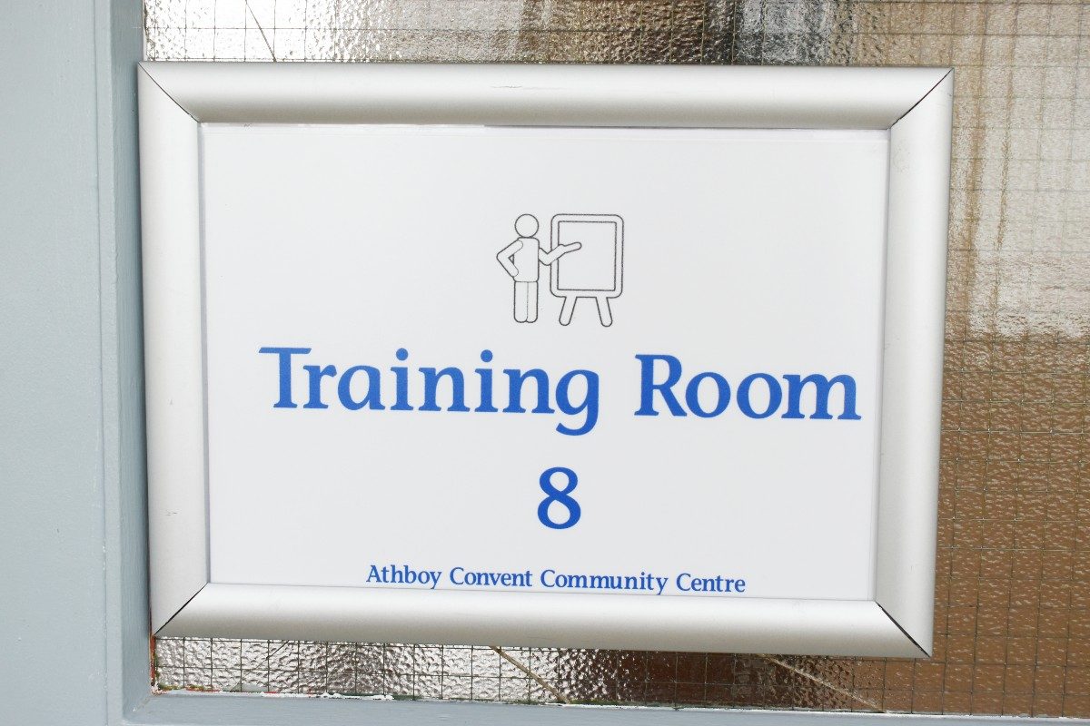 Training Room 8 sign on door.