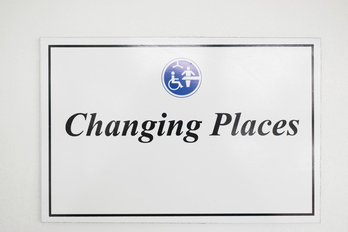 White sign saying 'Changing Places'