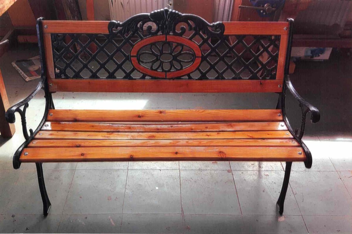 A wooden bench crafted by members of the Athboy Men's Shed.